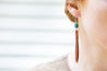 Turquoise & Leather Fringe Earrings shown on model.