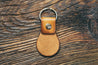 Backside detail of hand-crafted leather key fob
