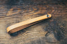 Hand-crafted guitar neck adapter strap in natural with nickel hardware. 