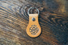 Hand-crafted leather key fob with Five-oh-Nine design embossed on front