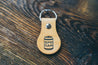 Hand-crafted leather key fob with beer can outline and the words "Spo Can" design embossed on front