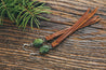 Handmade Jade & Leather Fringe Earrings shown on wood background
