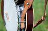 Leather adapter allows guitar straps to be used on banjos