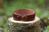 Heavy-duty Line 20 antique copper snap provides closure for leather cuff bracelet