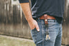 Man wearing mahogany leather HK clip key fob on his belt 