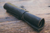 Side view of Espresso leather tool roll rolled up 