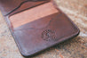 Detail of Colladay Leather makers mark on interior of handcrafted leather wallet